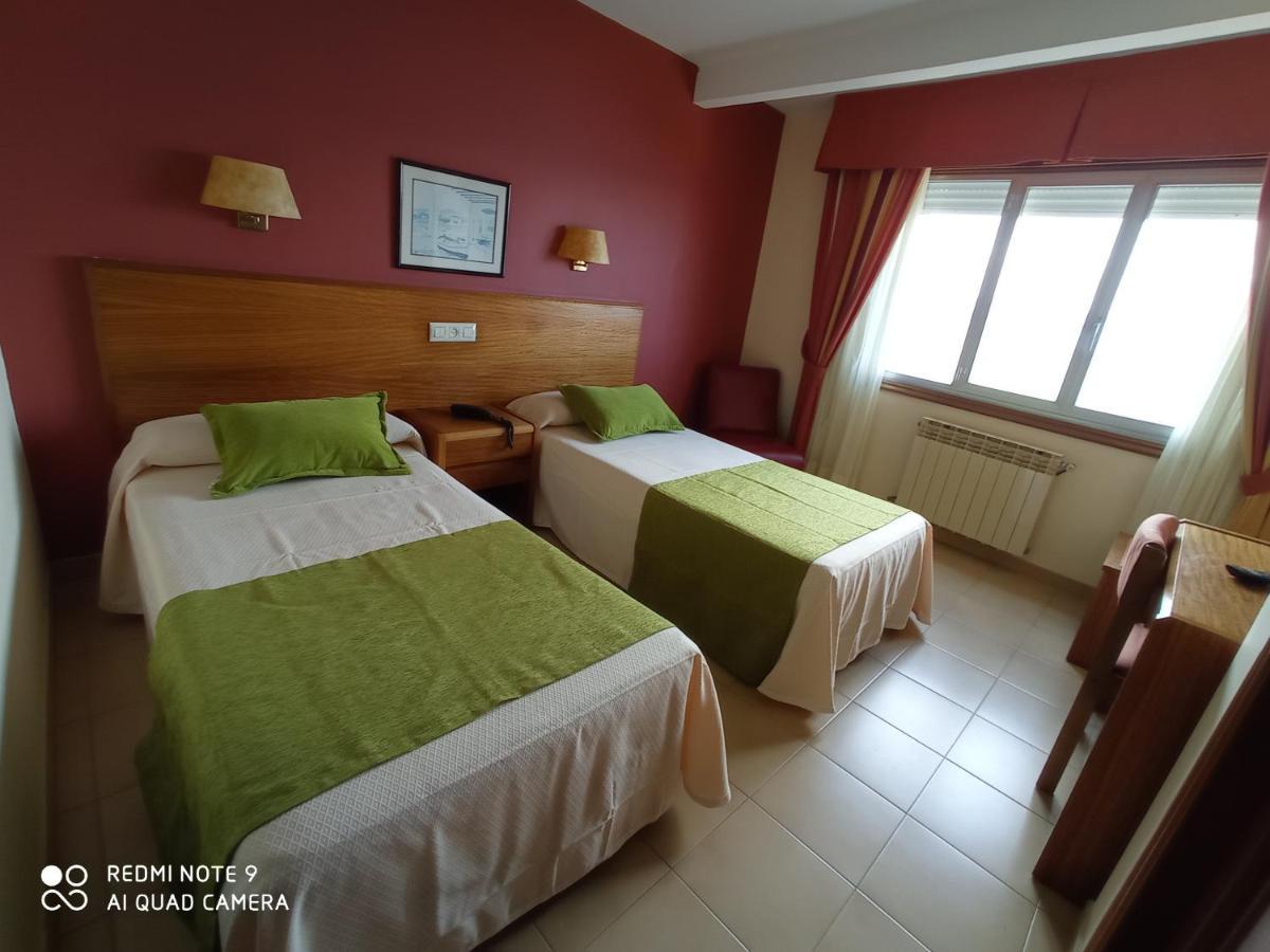 Hotel Siroco Portonovo Bagian luar foto