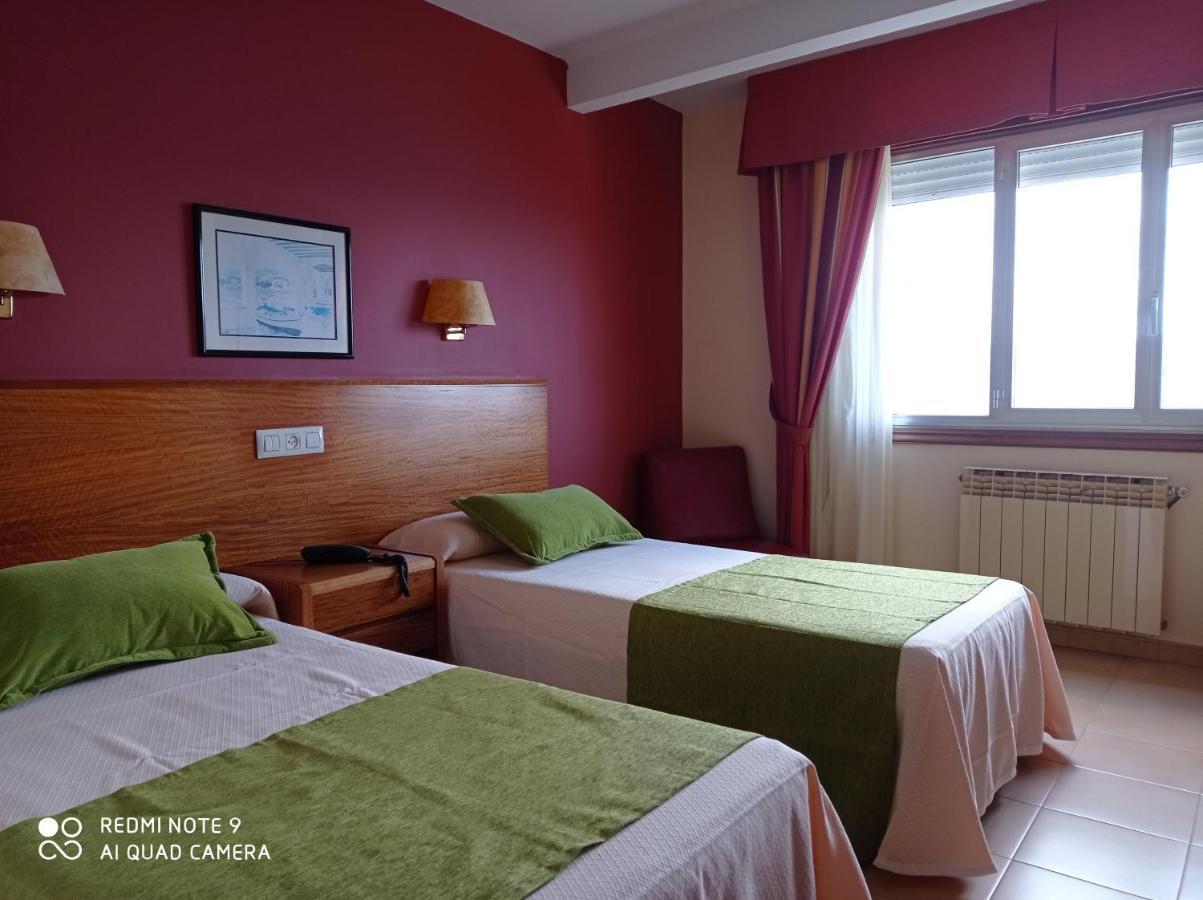 Hotel Siroco Portonovo Bagian luar foto